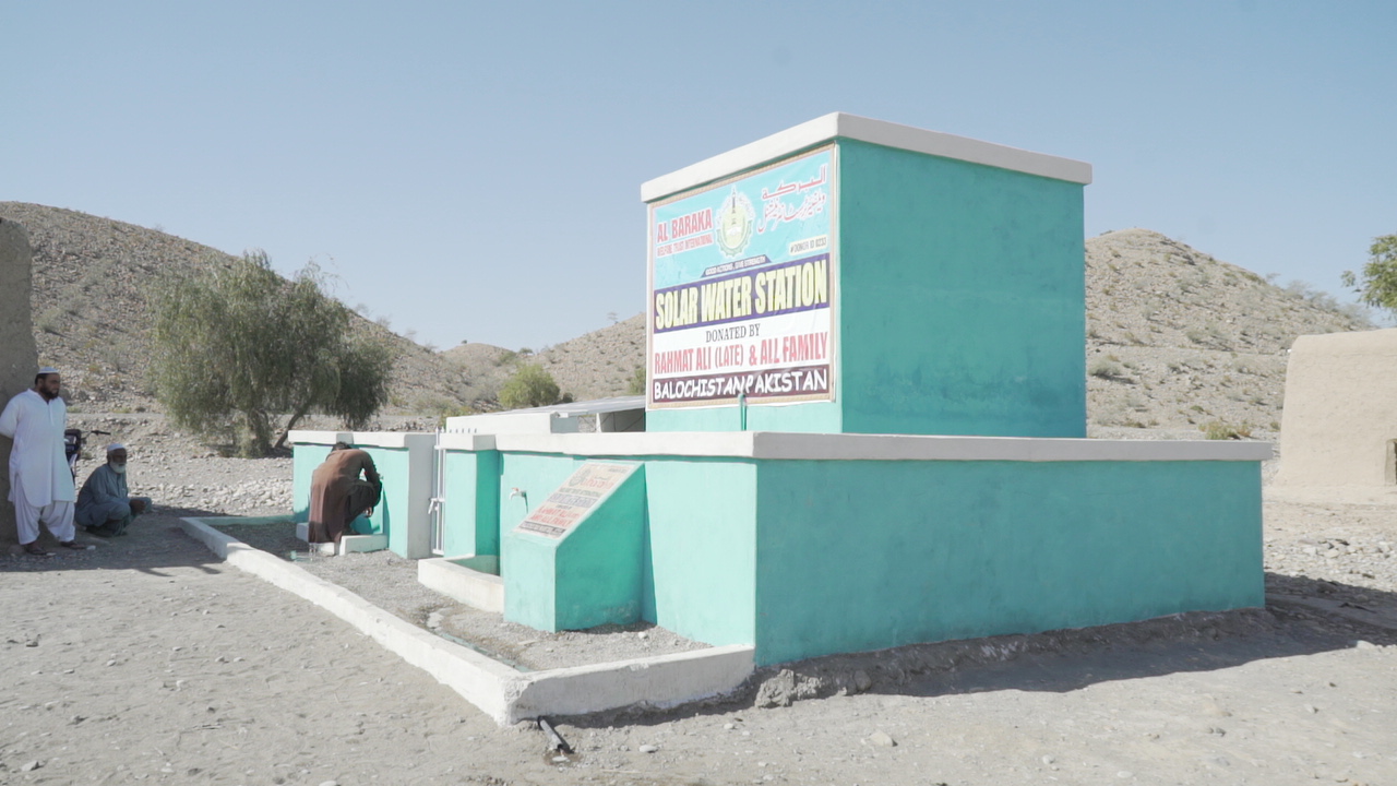Child at water source